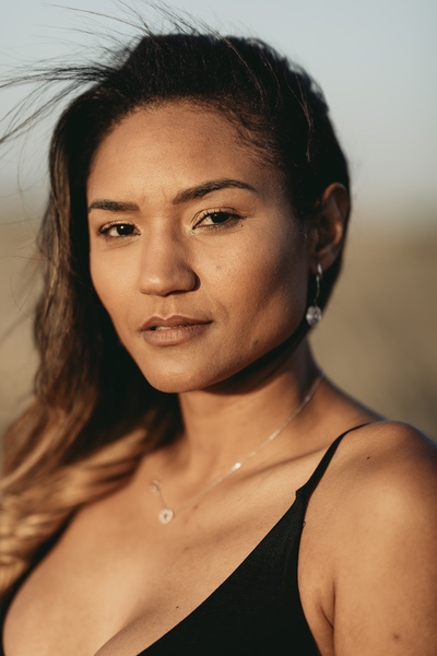 Woman at sunset with calm expression