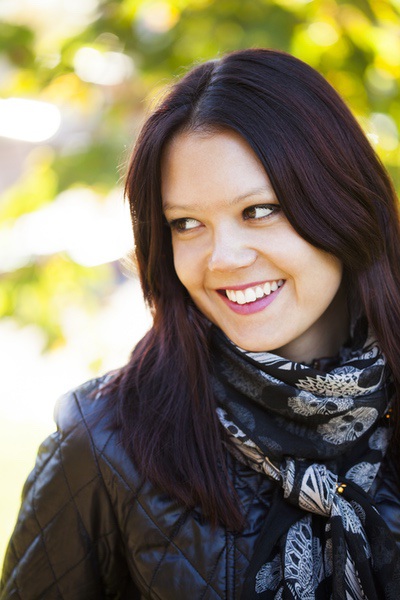 Woman smiling while looking away